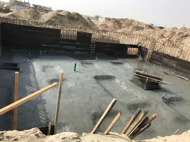 Foundation slab and waterproofed retaining walls during specialist civil work